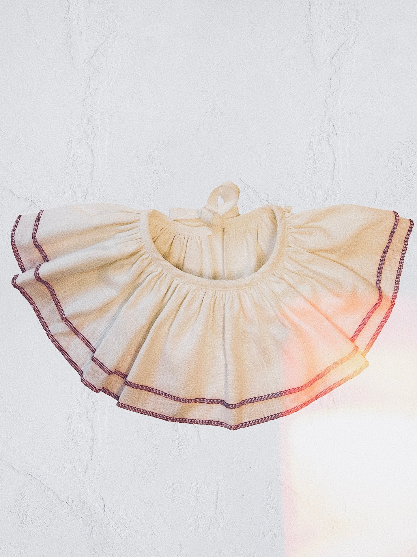 Oversized white ruffle collar