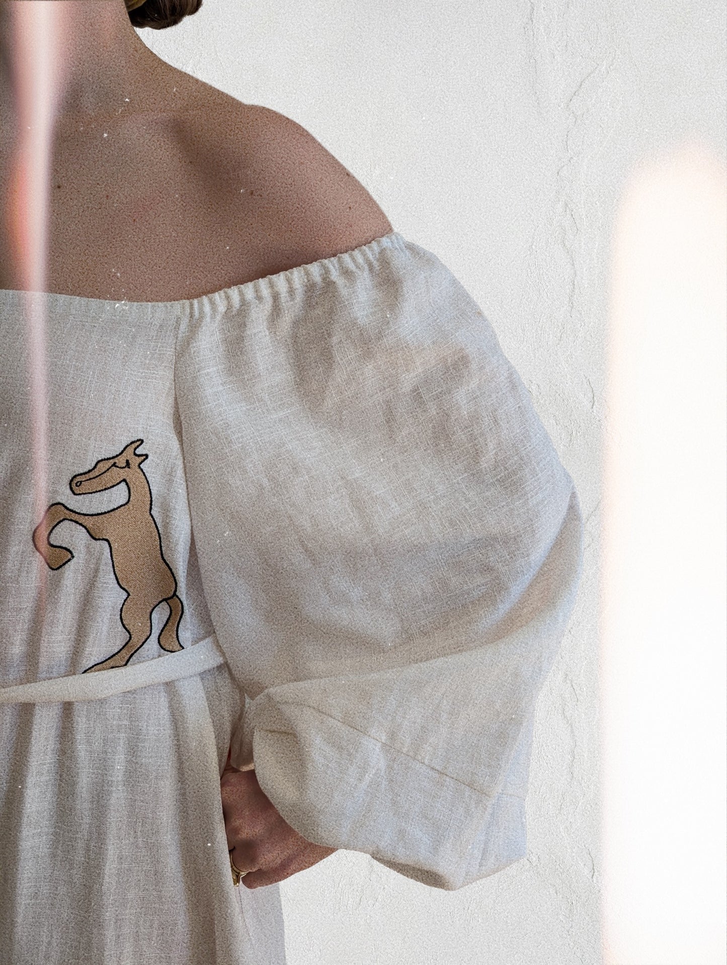 White embroidered off the shoulder dress