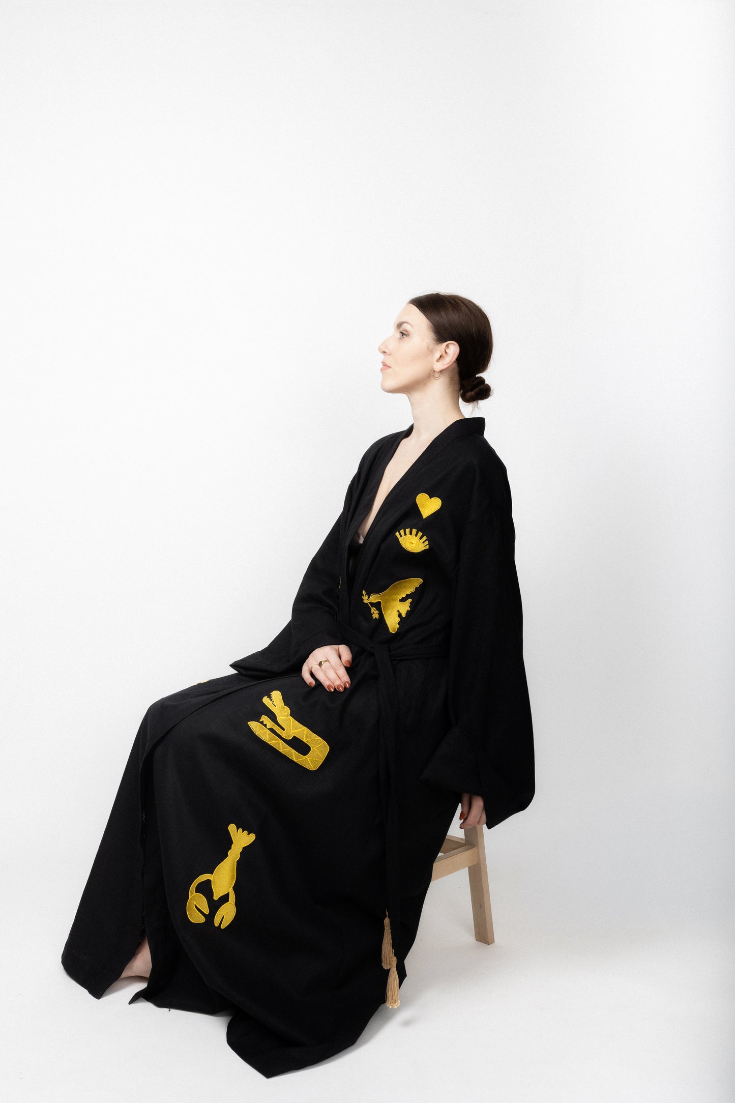 Black embroidered gold wrap gown