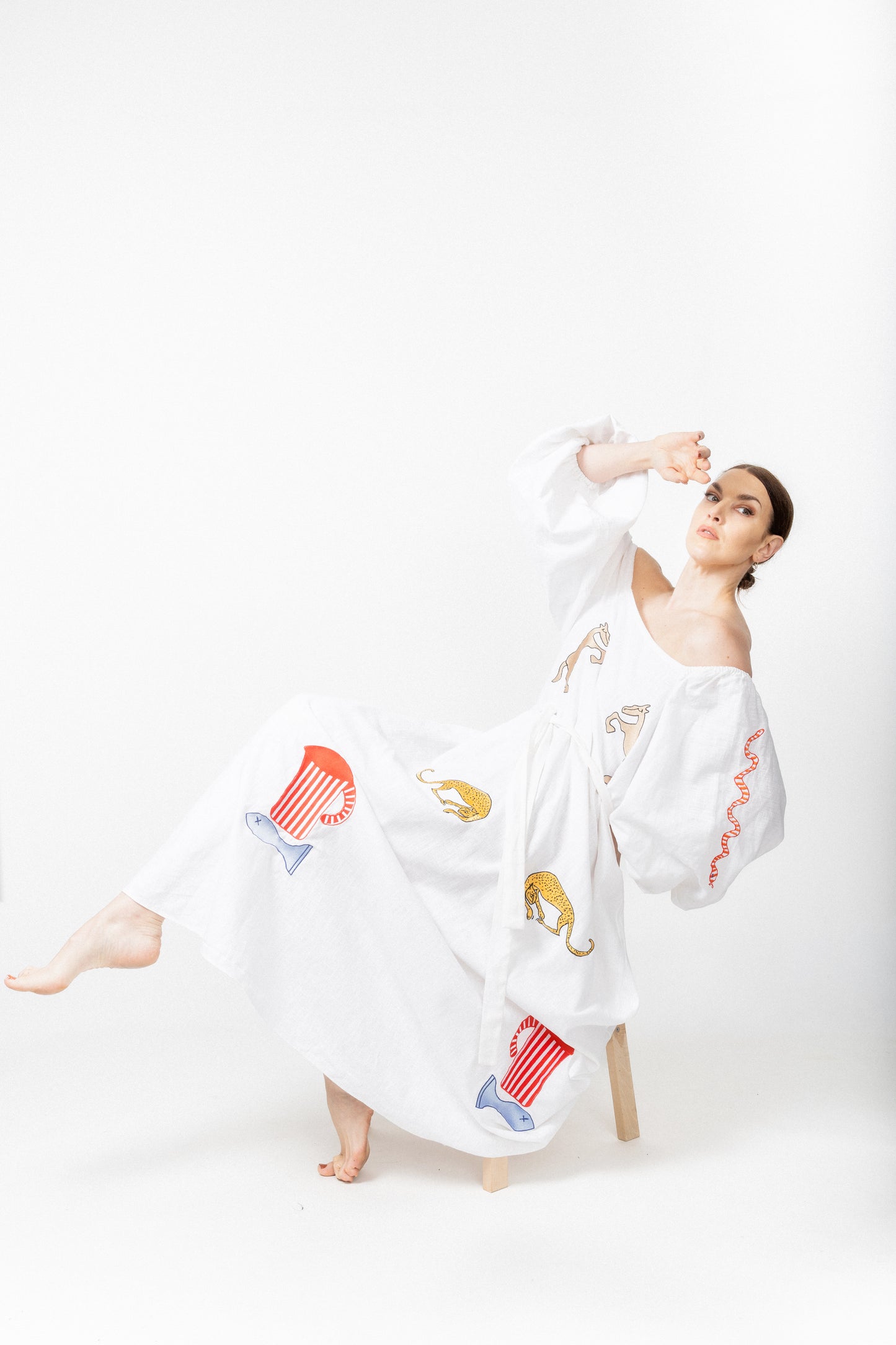 White embroidered off the shoulder dress