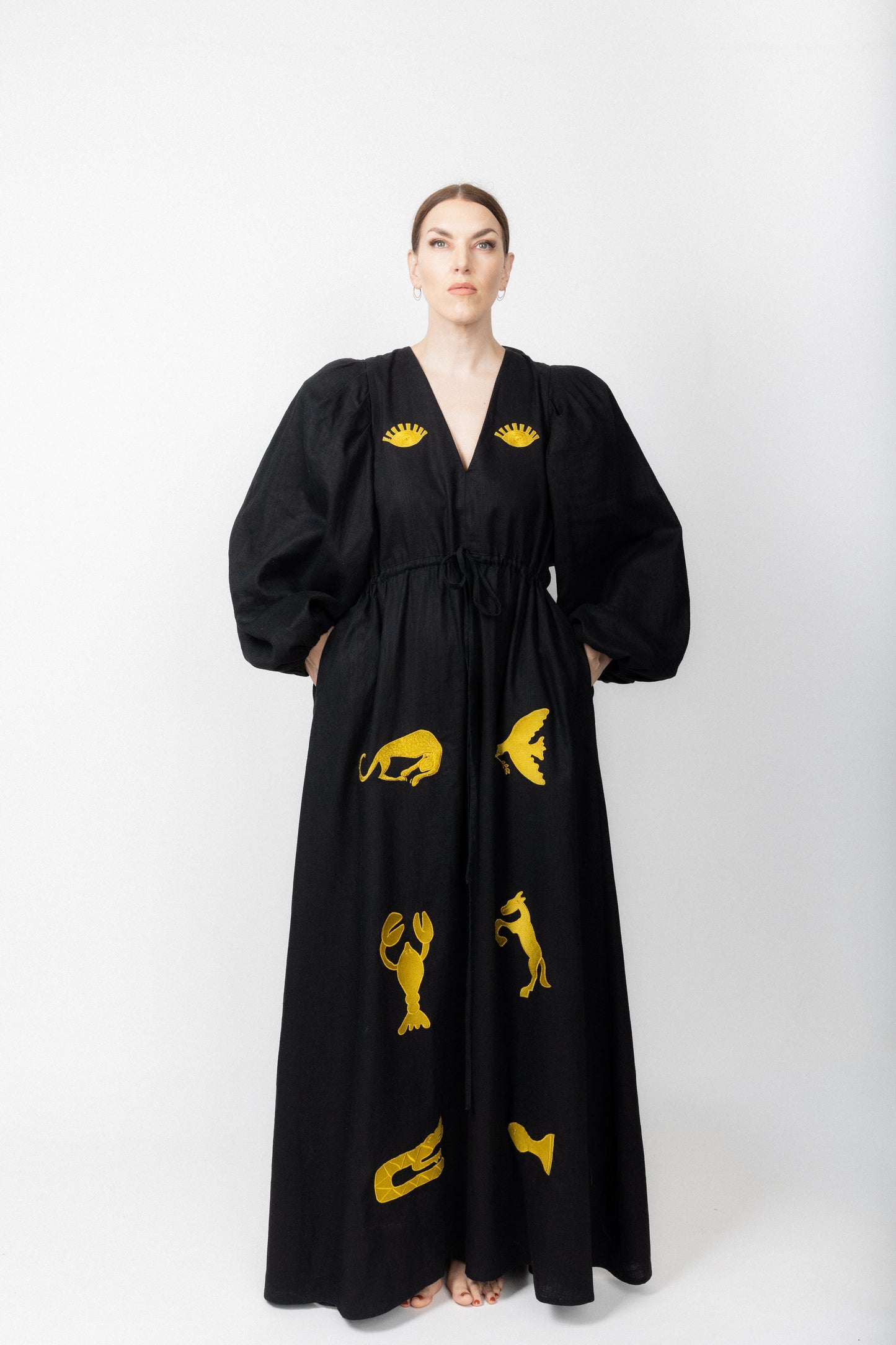 Black and gold embroidered v-neck dress