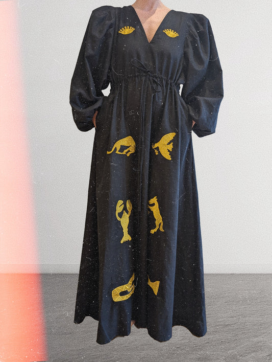 Black and gold embroidered v-neck dress
