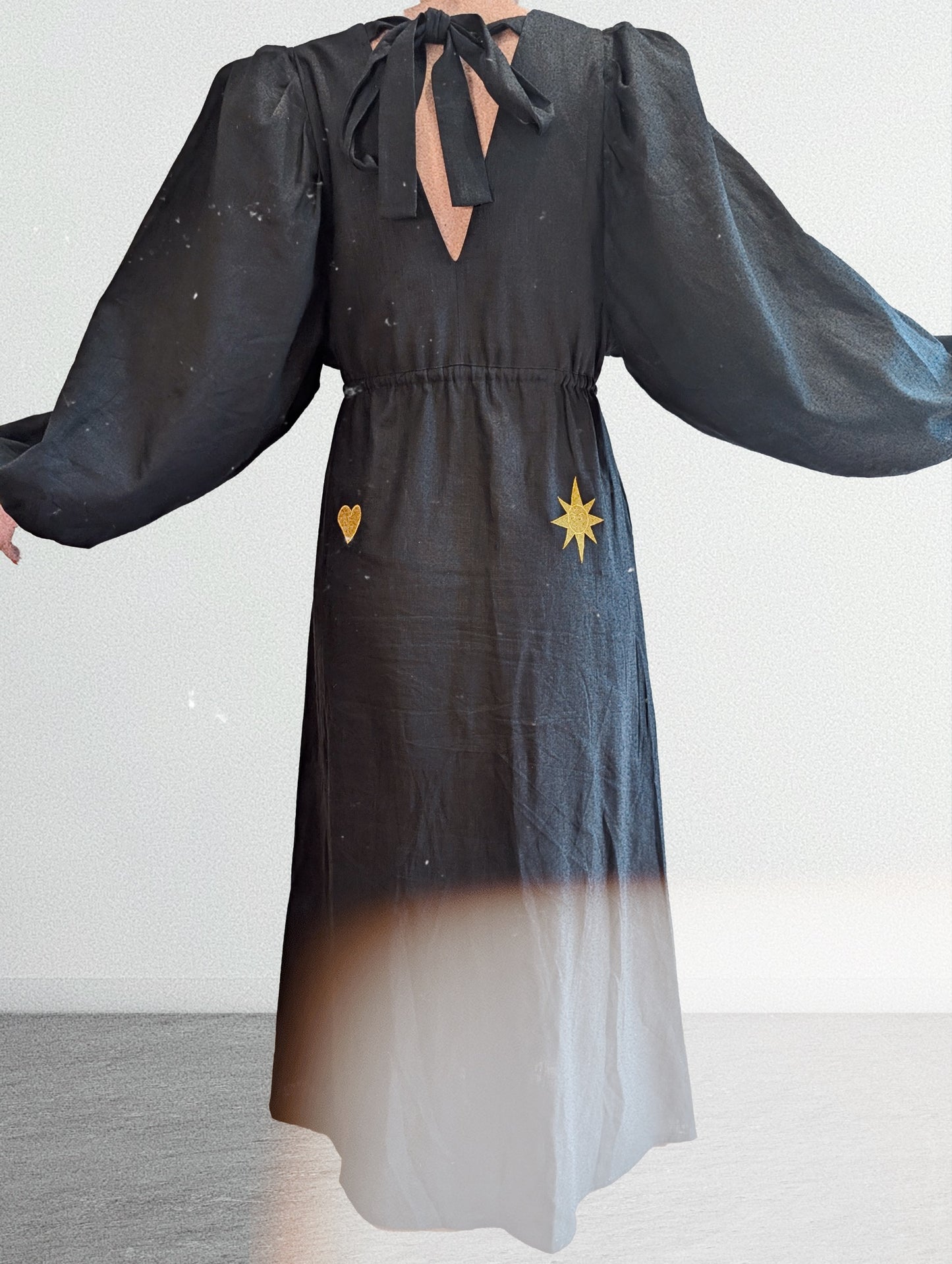 Black and gold embroidered v-neck dress